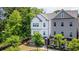 Charming townhome with a well-manicured lawn and lush greenery at 2106 Remy Ct, Kennesaw, GA 30144