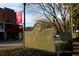 Informative historical marker detailing the significance of Big Shanty, set against a backdrop of charming streetscape at 2106 Remy Ct, Kennesaw, GA 30144