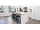 Bright kitchen featuring an island, stainless appliances, and ample cabinet space at 2106 Remy Ct, Kennesaw, GA 30144