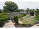 Beautifully landscaped park with tiered seating areas, lush greenery, and mature trees at 2106 Remy Ct, Kennesaw, GA 30144