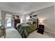 Spacious bedroom with large window, soft carpet, dresser and stylish decor at 5149 Roswell Rd # 7, Atlanta, GA 30342