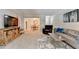 Bright, open living space flowing into the dining area with stylish furnishings at 5149 Roswell Rd # 7, Atlanta, GA 30342