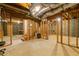 Large unfinished basement with stud framing and utilities at 5425 Windswept Trce, Sugar Hill, GA 30518