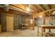 Unfinished basement space with wooden framing at 5425 Windswept Trce, Sugar Hill, GA 30518