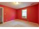 Bright bedroom with carpet and window with blinds at 5425 Windswept Trce, Sugar Hill, GA 30518