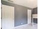Bedroom featuring gray walls, two doors, carpeted floors and a bunk bed at 5425 Windswept Trce, Sugar Hill, GA 30518