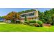 Lovely two-story home with well-maintained lawn and landscaping at 5425 Windswept Trce, Sugar Hill, GA 30518