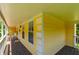 Spacious porch offering ample outdoor seating and relaxation at 5425 Windswept Trce, Sugar Hill, GA 30518