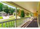 Relaxing porch view of the neighborhood at 5425 Windswept Trce, Sugar Hill, GA 30518