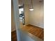 Dining area adjacent to kitchen features wood floors and natural lighting at 621 Ridge Creek Dr, Clarkston, GA 30021