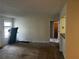 Spacious living room with doorway and view to dining and kitchen area at 621 Ridge Creek Dr, Clarkston, GA 30021
