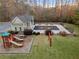 Aerial view of the pool, pool house, and playground at 1070 Cureton Dr, Austell, GA 30106