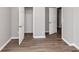 Bedroom view highlighting an open closet and a neutral color scheme at 11827 Spring Lake Way, Fayetteville, GA 30215