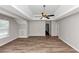 Bedroom with hardwood floor, trey ceiling, ceiling fan and lots of light at 11827 Spring Lake Way, Fayetteville, GA 30215