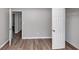 Bedroom highlighting a closet and a window with horizontal blinds at 11827 Spring Lake Way, Fayetteville, GA 30215