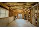 Unfinished basement with exposed insulation and a framed doorway at 1320 Kildare Ct, Snellville, GA 30078