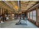 Unfinished basement space with exposed beams and plenty of potential at 1320 Kildare Ct, Snellville, GA 30078