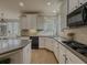 Gourmet kitchen featuring modern appliances, lots of countertop space, and a functional design at 1320 Kildare Ct, Snellville, GA 30078