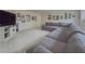Living room featuring a large couch, a television, and several picture frames at 1320 Kildare Ct, Snellville, GA 30078