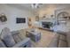 Bright living room showcasing a cozy fireplace, built-in shelving, and neutral decor creating an inviting atmosphere at 1320 Kildare Ct, Snellville, GA 30078