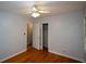 Cozy bedroom offers ceiling fan, hardwood floors and plenty of closet space at 1376 Woodbine St, Marietta, GA 30062