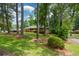 Well-maintained home with a brick facade, situated on a spacious lot with mature trees at 1376 Woodbine St, Marietta, GA 30062