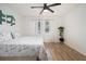 Brightly lit bedroom with white walls, modern ceiling fan, and great natural light at 2537 Baker Nw Rd, Atlanta, GA 30318