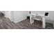 Bright office space with hardwood floors, with a modern minimalist desk at 2537 Baker Nw Rd, Atlanta, GA 30318