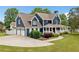 Well maintained two-story home with two car garage, manicured lawn and tasteful landscaping at 2545 Hickory Level Rd, Villa Rica, GA 30180