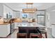 Well-lit kitchen featuring an island, stainless steel appliances, wood countertops, and white cabinets at 2545 Hickory Level Rd, Villa Rica, GA 30180