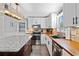 Bright kitchen with wooden countertops, stainless steel appliances and a granite kitchen island with seating at 2545 Hickory Level Rd, Villa Rica, GA 30180