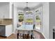 Cozy breakfast nook with a view of the backyard and access to the patio at 3400 Dencrest Se Ct, Smyrna, GA 30080