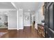 Inviting foyer with hardwood floors, decorative trim, and a view into the dining area at 3400 Dencrest Se Ct, Smyrna, GA 30080
