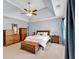 Spacious main bedroom with trey ceiling, stylish decor, and cozy furniture at 3400 Dencrest Se Ct, Smyrna, GA 30080