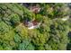 Aerial view of the property showing treed landscape and long driveway at 5345 Pilgrim Point Rd, Cumming, GA 30041