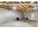 An unfinished basement offers space for storage and easy access to utilities at 5345 Pilgrim Point Rd, Cumming, GA 30041