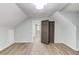 A bright bedroom offers laminate flooring, with a hall and closet area at 5345 Pilgrim Point Rd, Cumming, GA 30041