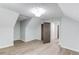 A well-lit bedroom features modern paint, laminate flooring, and closet access at 5345 Pilgrim Point Rd, Cumming, GA 30041