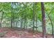 Lakeside view with personal dock and boat slip at 5345 Pilgrim Point Rd, Cumming, GA 30041