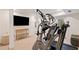 Well-lit basement features modern exercise equipment, creating a dedicated space for fitness activities at 1748 N Pelham Ne Rd, Atlanta, GA 30324