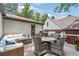 Spacious deck with ample seating, table, and grill, perfect for outdoor gatherings and relaxation at 1748 N Pelham Ne Rd, Atlanta, GA 30324