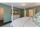 Spacious bedroom with a four-poster bed, dresser, and a serene ambiance at 1748 N Pelham Ne Rd, Atlanta, GA 30324