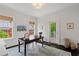 Light-filled home office features large windows, neutral paint, and hardwood floors at 1748 N Pelham Ne Rd, Atlanta, GA 30324