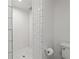 This bathroom includes a fully tiled standing shower with white subway tile and a dark shower head at 1748 N Pelham Ne Rd, Atlanta, GA 30324