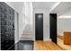 Home entryway featuring black-and-white tile flooring and a staircase at 1924 Variations Ne Dr, Atlanta, GA 30329