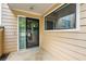The doorway is inviting and well lit, showcasing an easy entry into the home at 1924 Variations Ne Dr, Atlanta, GA 30329