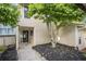 Inviting exterior of home featuring tidy landscaping and covered entryway at 1924 Variations Ne Dr, Atlanta, GA 30329