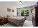 Cozy bedroom features a large window that allows ample natural light to fill the room at 237 Parc Drive Dr, Canton, GA 30114