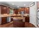 Well-equipped kitchen with stainless steel appliances, a central island, and plenty of cabinet space at 237 Parc Drive Dr, Canton, GA 30114