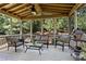 Relaxing screened porch with comfortable seating and a view of the lush backyard, perfect for enjoying the outdoors at 237 Parc Drive Dr, Canton, GA 30114